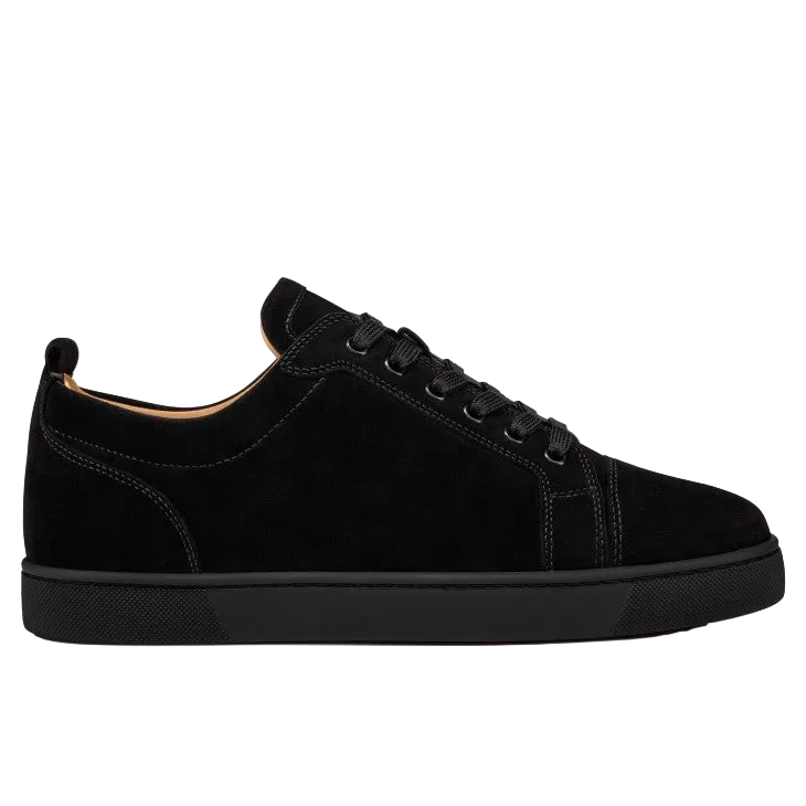 Black sneaker with 'Snowbox' branding on a white background