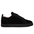 Black sneaker with 'Snowbox' branding on a white background