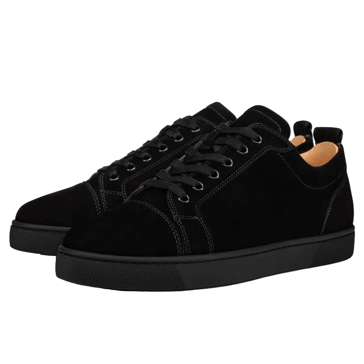 Pair of black sneakers on a white background