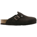 Brown suede clog shoe with a buckle on a white background