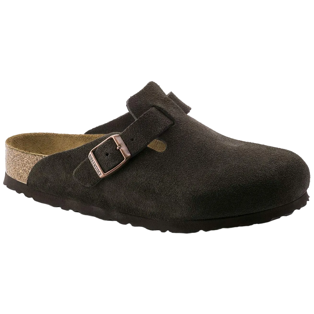 Brown suede clog shoe with a buckle on a white background