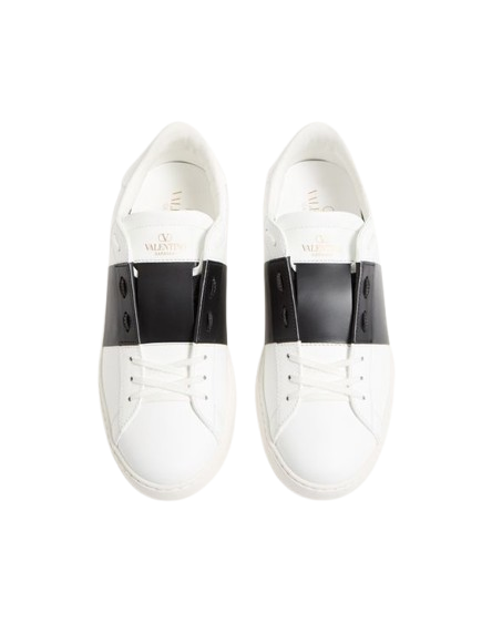 White sneakers with black accents on a white background