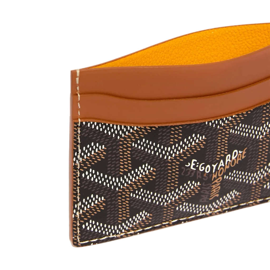 Cardholder with patterned design and brown accents on a white background