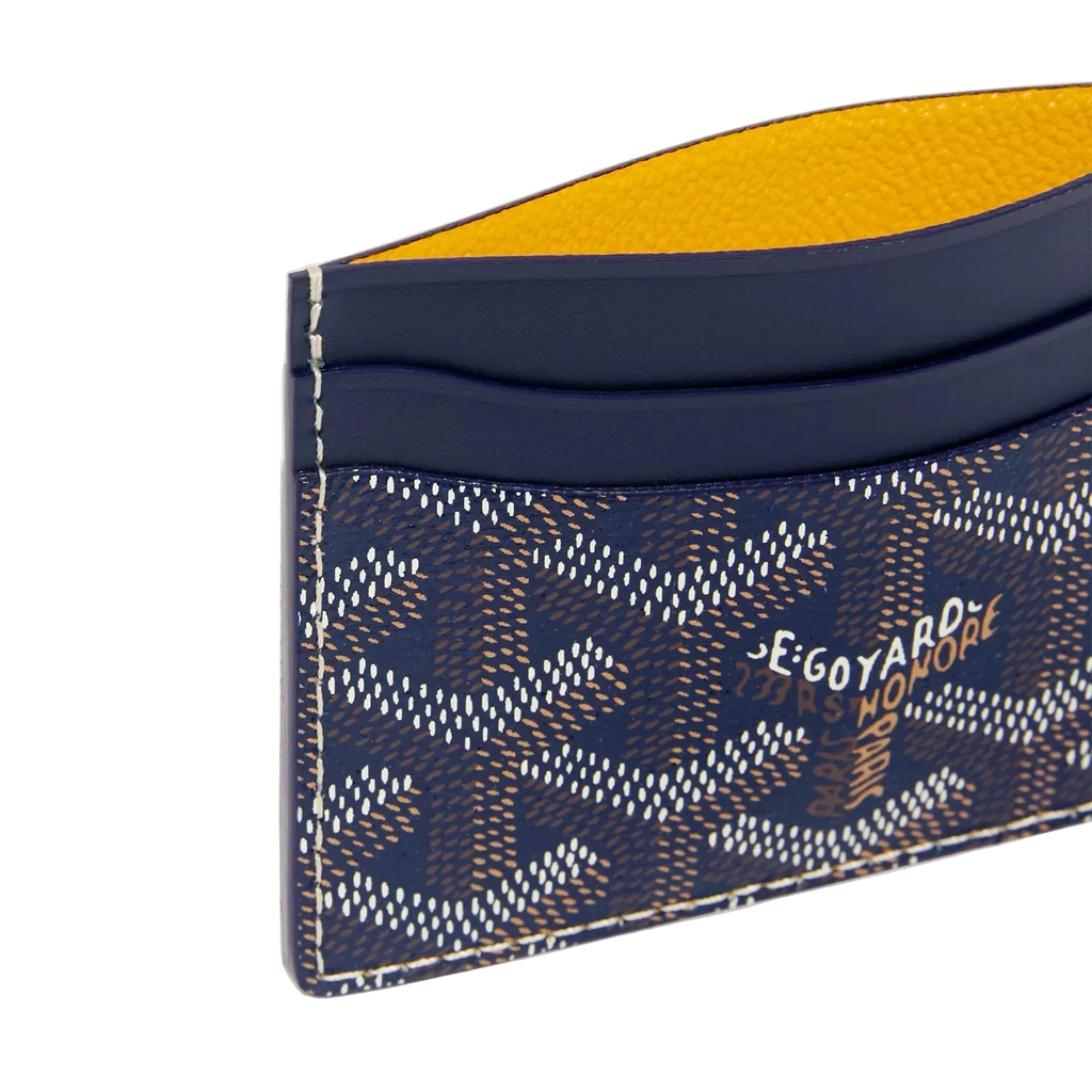 Goyard cardholder with blue and yellow design on a white background