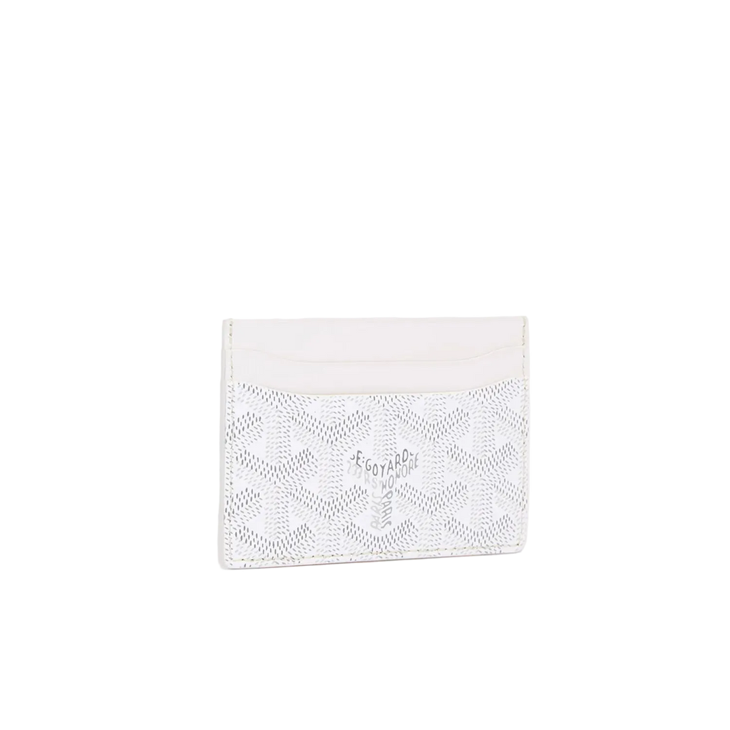 White pouch with lace detailing on a light beige background