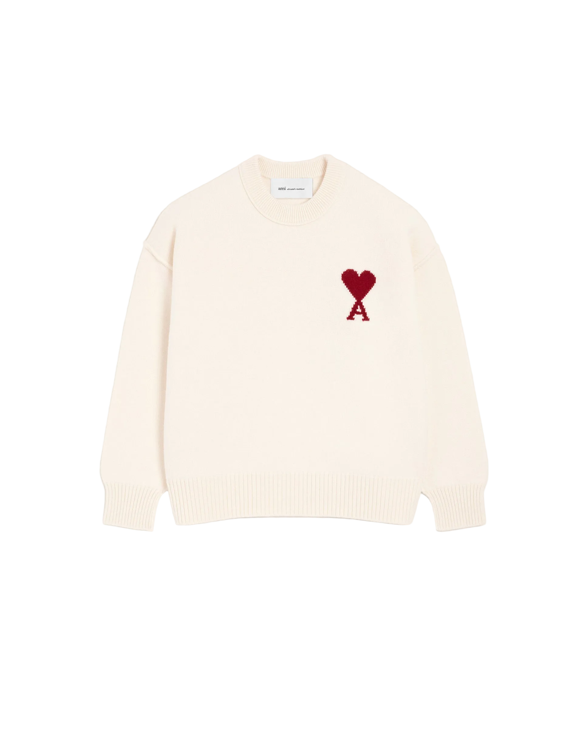 White sweater with a red heart and letter 'A' design on a light gray background